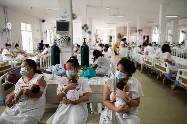Mothers carrying their newborn babies queue for a check-up inside the maternity ward of the government-run Dr. Jose Fabella Memorial Hospital in Manila, Philippines. REUTERS/Eloisa Lopez  